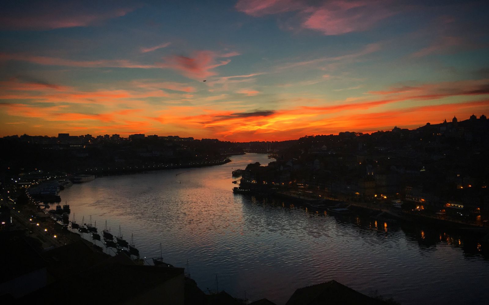 Sunset over the Douro River and Porto skyline