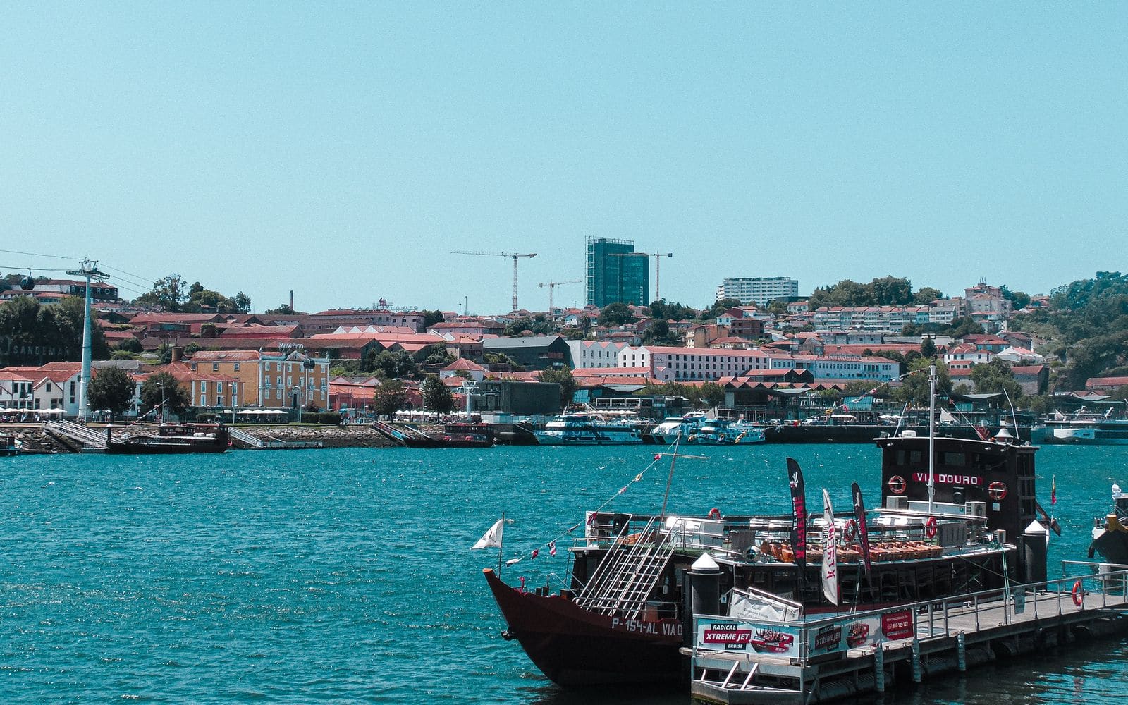 Porto's Ribeira waterfront and traditional boats on the Douro River